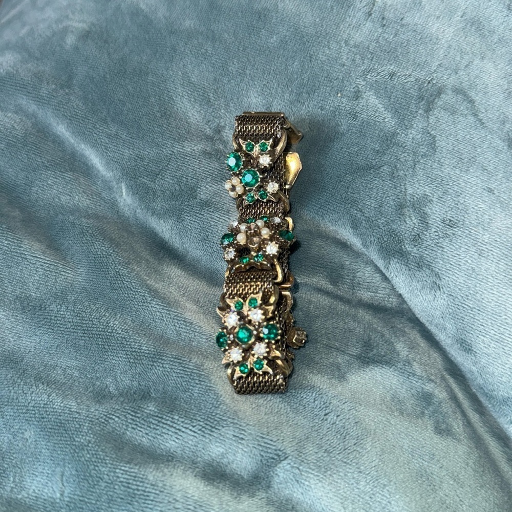 Ringtone gold tone bracelet